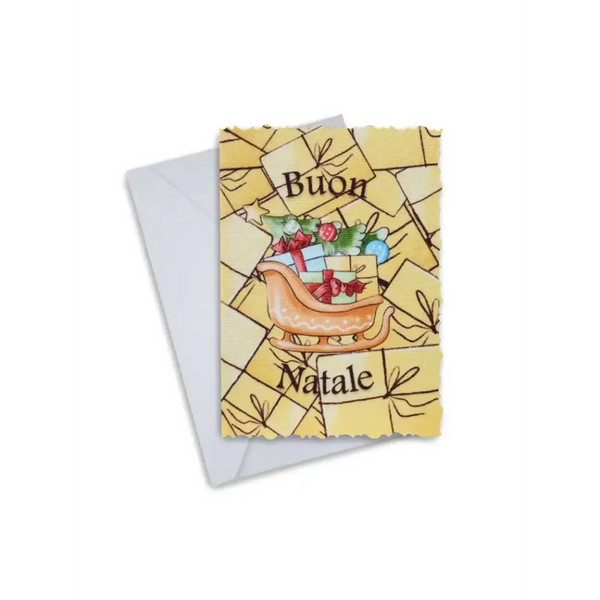 Elegant Christmas greeting card with festive sleigh design and "Buon Natale" text, featuring vibrant colors and festive decorations.