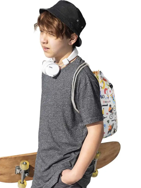 Teen wearing Dia-Bucket Bag with diabetes-themed illustrations, holding a skateboard.