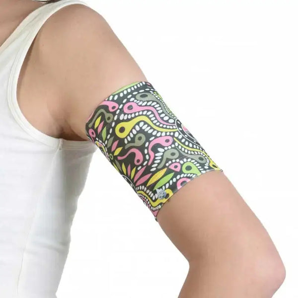 Blood glucose sensor armband for kids with colorful pattern.