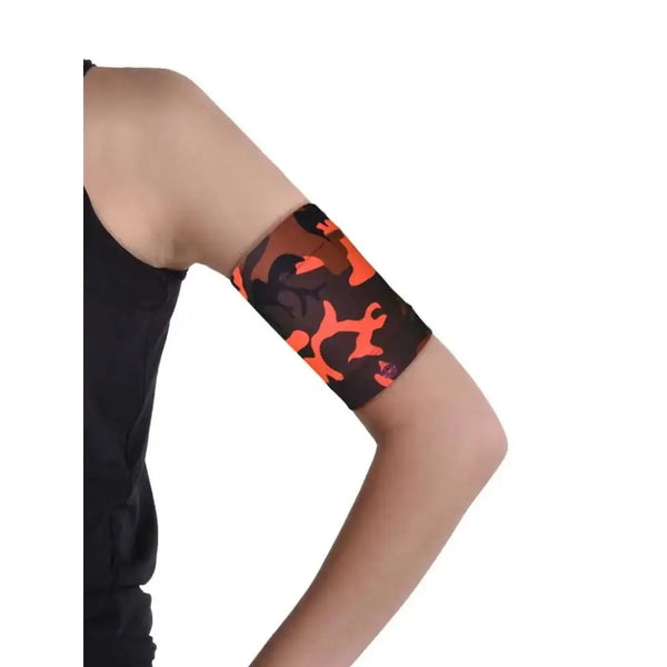 Fluorescent Dia-Band armband securing insulin patch pump and glucose sensor.