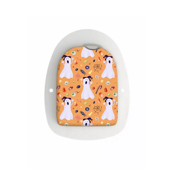 Omnipod insulin pump with Halloween-themed sticker featuring ghosts and candy.