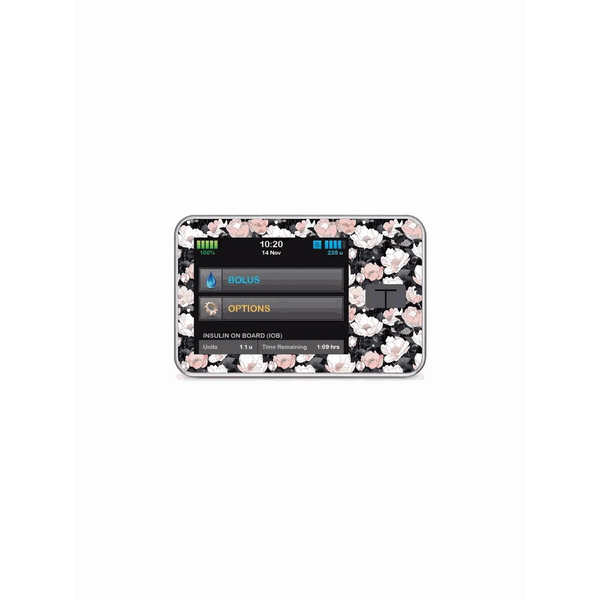 Tandem T-Slim insulin pump with floral vinyl sticker, Spring Edition 2025.
