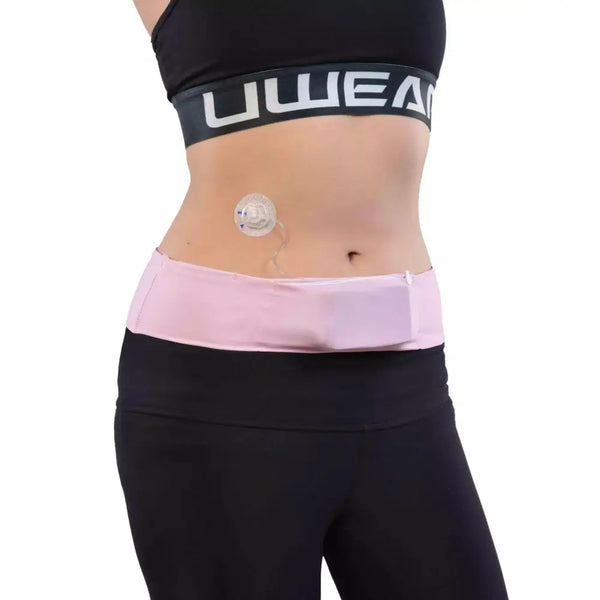Universal Insulin Pump Waist Belt in pink, featuring a discreet design for active lifestyles.