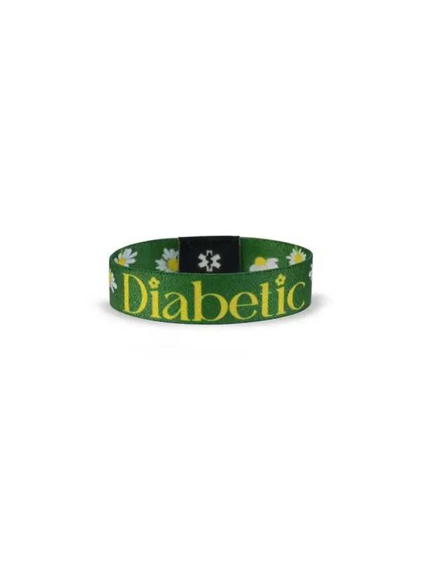 Reversible Type 1 Diabetes Awareness Wristband for Children with daisies, "Diabetic" text, green background.