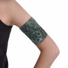 Stylish blood glucose sensor armband in dark printed colors for diabetes management.