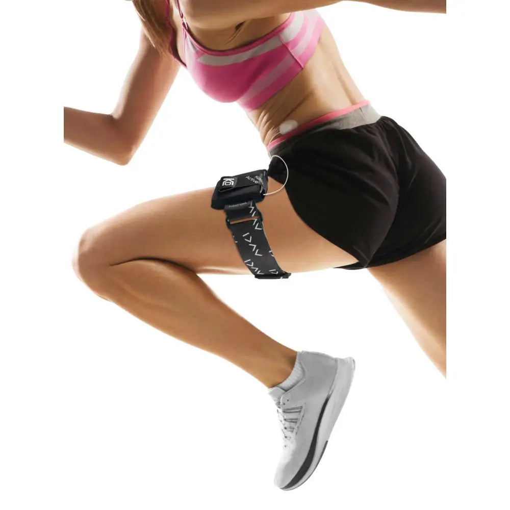 Runner wearing an insulin pump leg band with pouch on the thigh Image