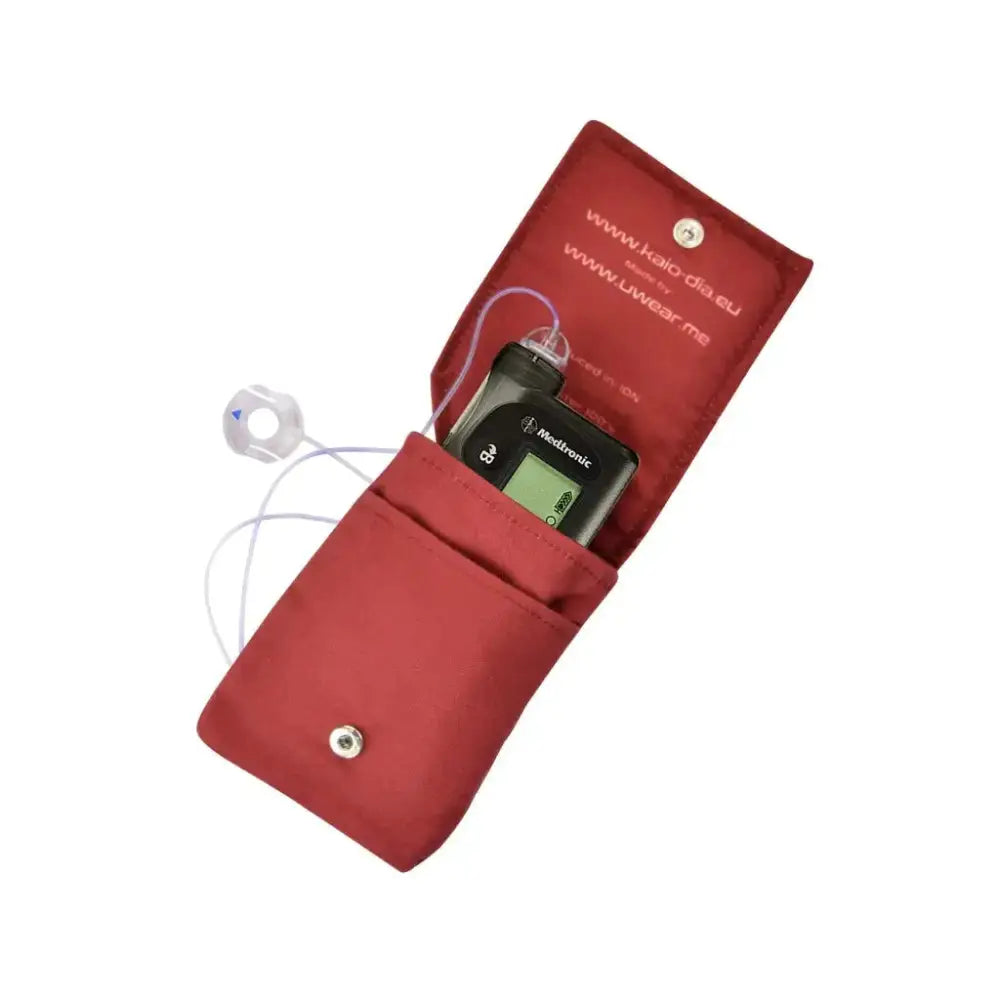 Open red insulin pump pouch holding an insulin pump Image