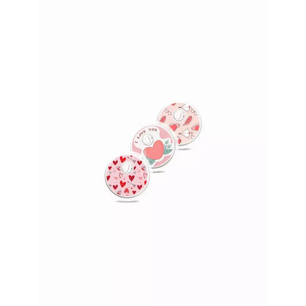 Libre 3 Valentine Edition sensor stickers in vibrant heart designs, set of three.