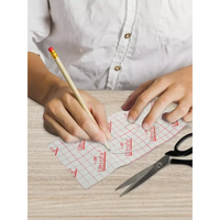 Crafting custom CGM sensor patches with Kaio-Patch Template, featuring acrylic template for precise cuts.