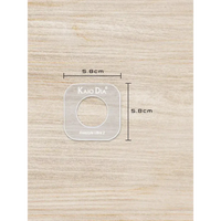 CGM Sensor Patch Template on wood surface displaying dimensions.