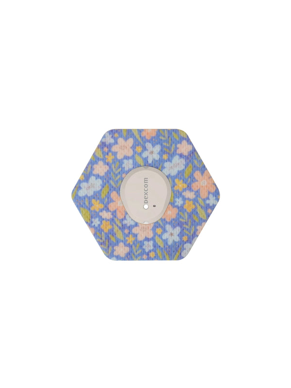 Dexcom G7 hexagonal shape patch in Meadow floral design, breathable adhesive overpatch to help support sensor wear