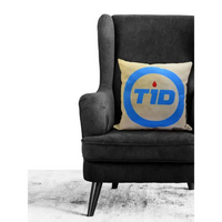 Diabetes Awareness Pillow Cover on dark armchair, blue circle design, supportive home decor.