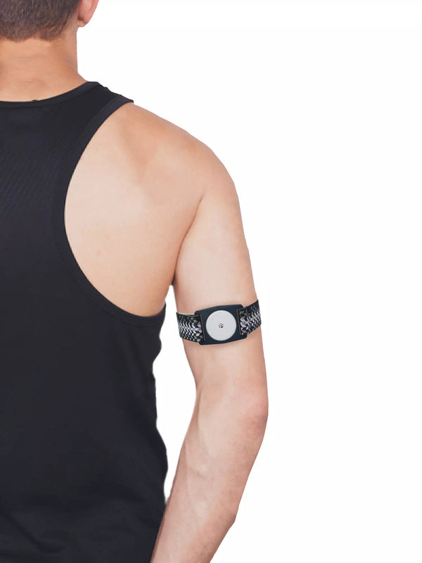 Adjustable Libre 2 Armband with stylish graphic design worn on upper arm.