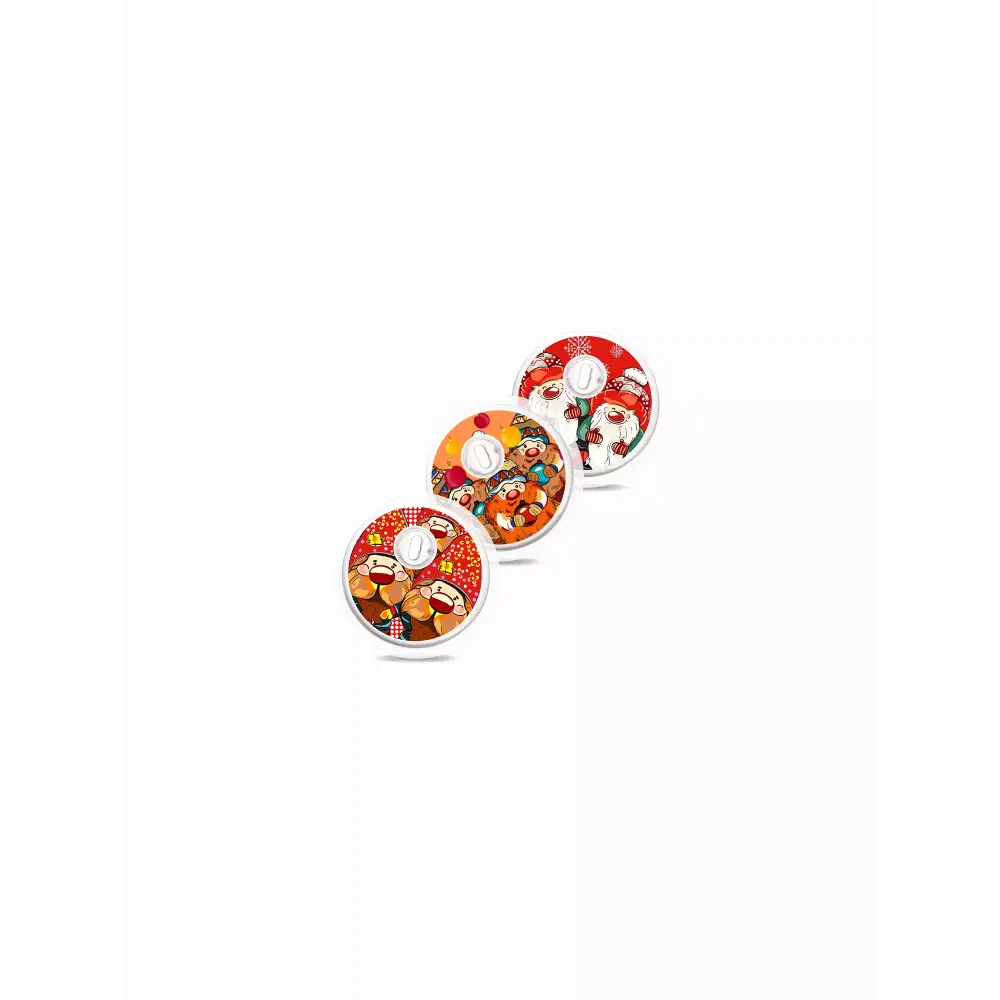 Four circular containers of colorful candies with Freestyle Libre Christmas-themed stickers