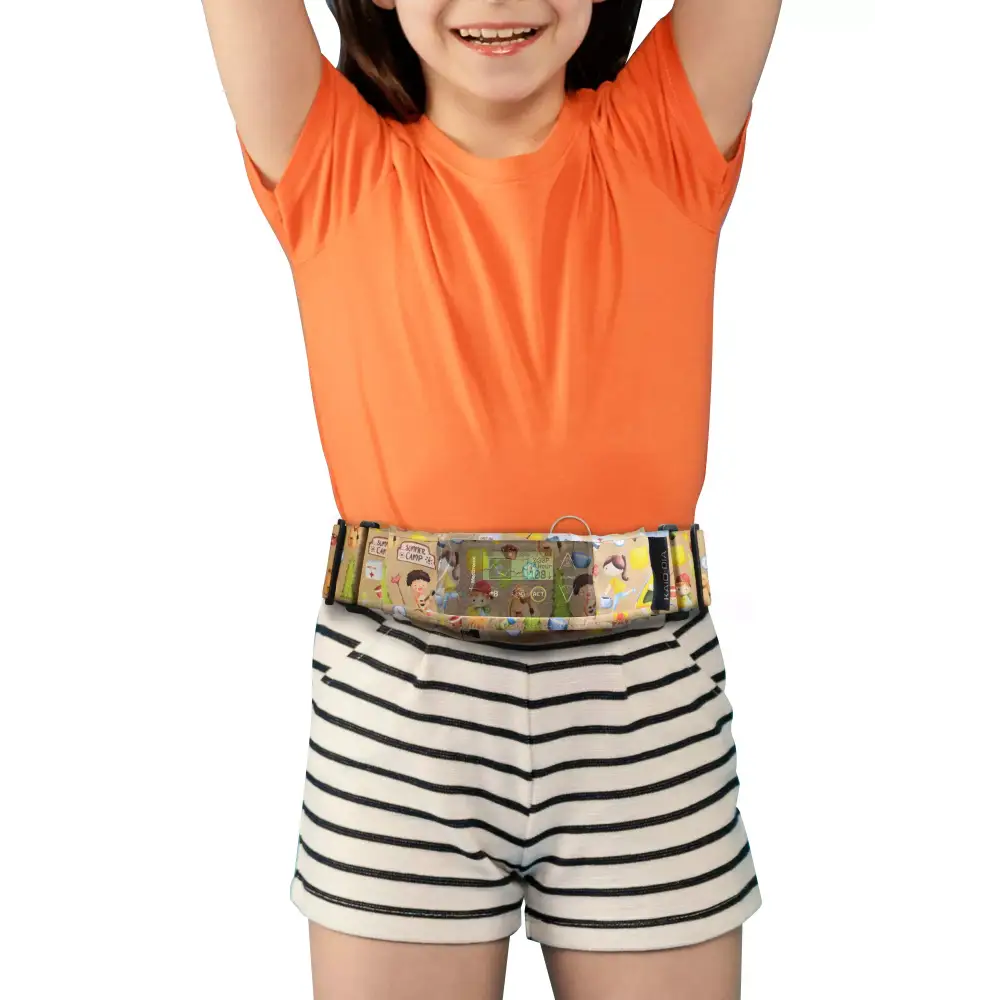 Child wearing Dia-Waist insulin pump belt with window in vibrant "Summer Camp" design.