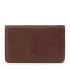 Leather insulin pump holder in brown full-grain leather with magnetic closure for diabetes management.