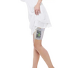 Lace garter for insulin pump in white lace worn on thigh under white dress for secure and stylish device carrying