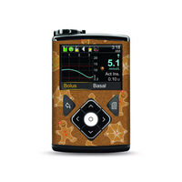 Medtronic MiniMed Insulin Pump with Christmas gingerbread and stars decorative skin