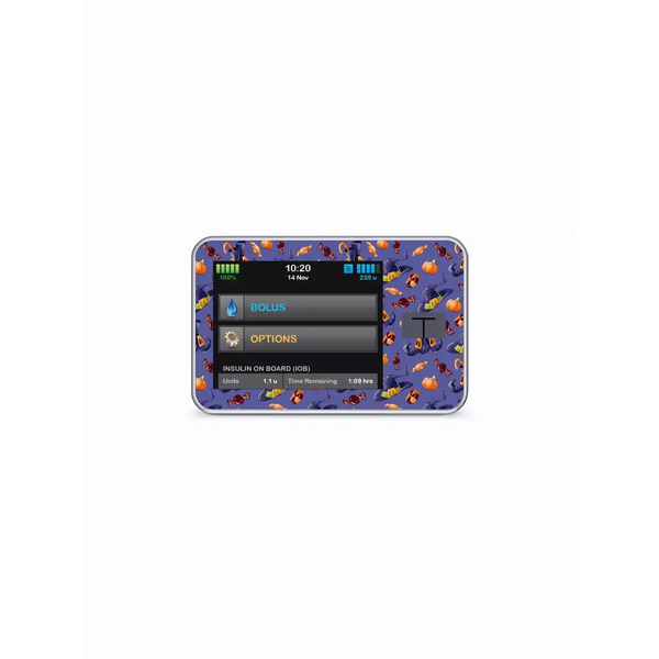 Tandem t:slim Insulin Pump with Halloween-themed stickers, showcasing festive designs.