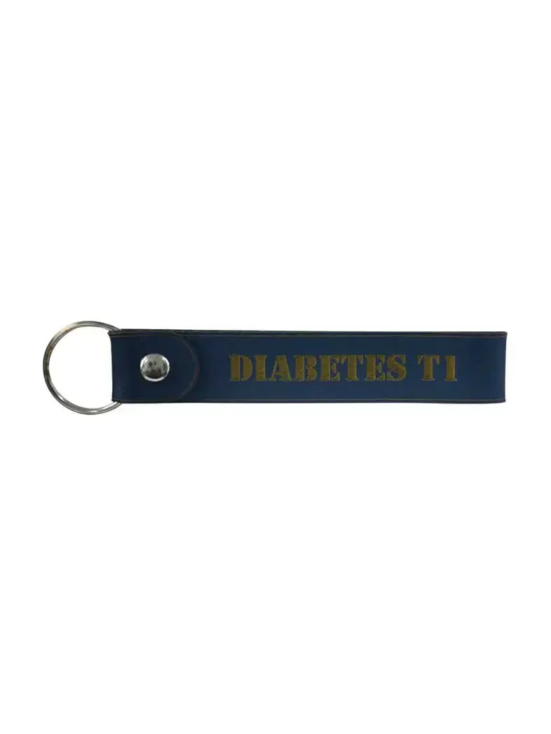 Diabetes Type 1 leather keychain in navy blue with metallic text, featuring a keyring for easy attachment.