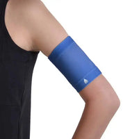 Children wearing blue armband for blood glucose sensor protection.