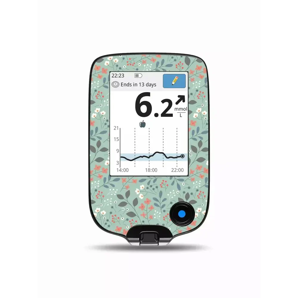 Freestyle Libre Reader with Spring Edition floral design sticker.
