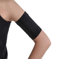 Child wearing black glucose sensor armband for Dexcom and Freestyle Libre.