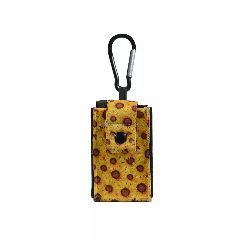 Universal pouch for insulin pump with carabiner, sunflower pattern, compact design.